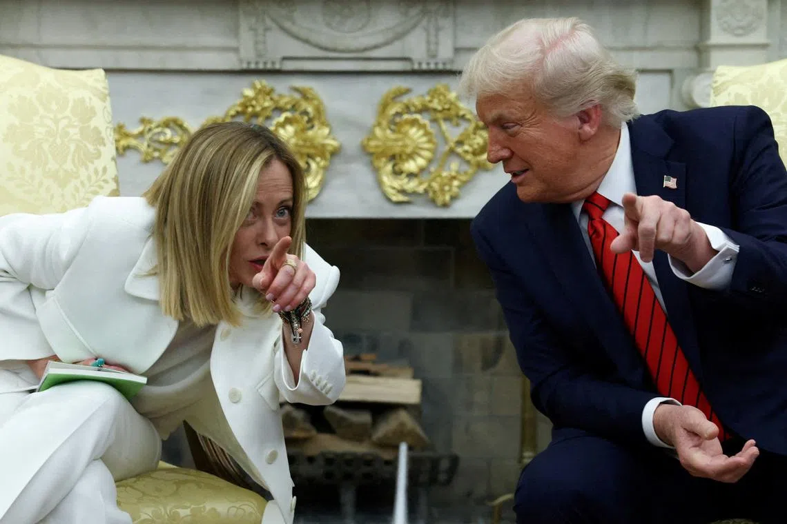 FILE PHOTO: U.S. President Donald Trump meets with Italian Prime Minister Giorgia Meloni in the Oval Office at the White House in Washington, D.C., U.S., April 17, 2025. REUTERS/Evelyn Hockstein/File Photo