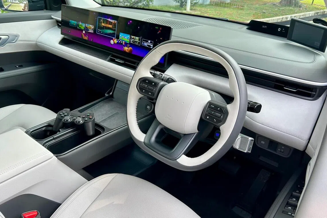 The Hyundai Elexio’s massive infotainment screen packs preloaded arcade games that can be accessed with a PlayStation-style wireless controller.