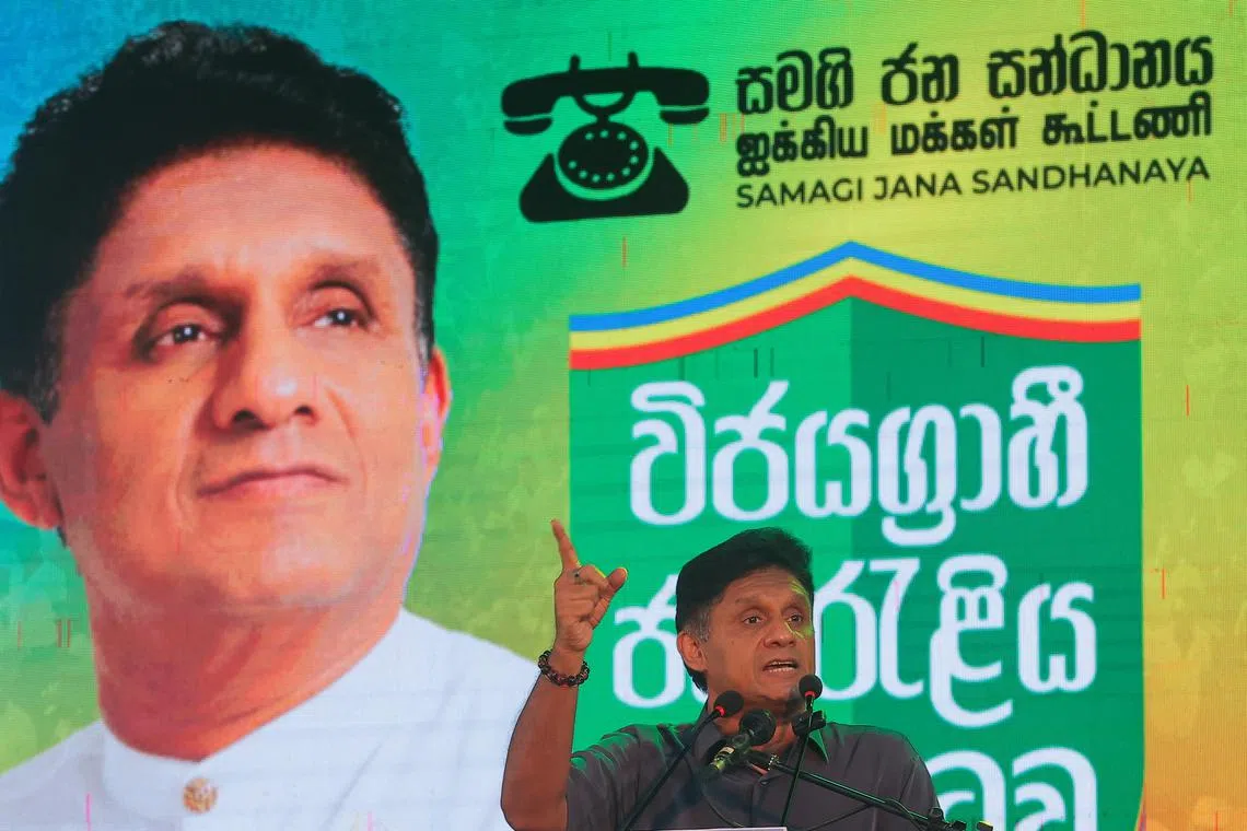 Sajith Premadasa, leader of the Samagi Jana Balawegaya party, addresses his supporters at an election campaign rally for the upcoming presidential election, scheduled for September 21, in Colombo, Sri Lanka August 22, 2024. REUTERS/Dinuka Liyanawatte/ File Photo