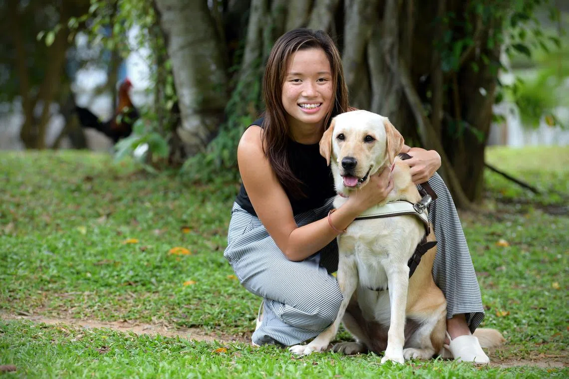 Paralympic swimmer Sophie Soon with her guide dog Orinda. 
