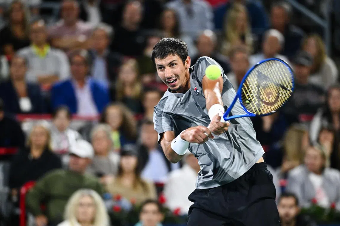 MONTREAL, CANADA - AUGUST 12: Alexei Popyrin of Australia plays a backhand during the Men's Singles Final match against Andrey Rublev on day seven of the ATP Masters 1000 National Bank Open at Stade IGA on August 12, 2024 in Montreal, Canada.   Minas Panagiotakis/Getty Images/AFP (Photo by Minas Panagiotakis / GETTY IMAGES NORTH AMERICA / Getty Images via AFP)