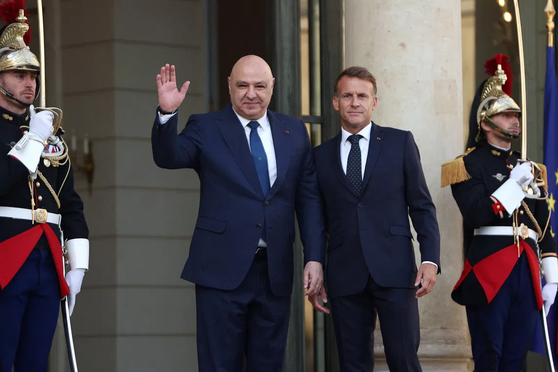 French President Emmanuel Macron welcomes Lebanese President Joseph Aoun as he arrives for a bilateral meeting at the Elysee Palace in Paris, France, September 17, 2026. REUTERS/Abdul Saboor