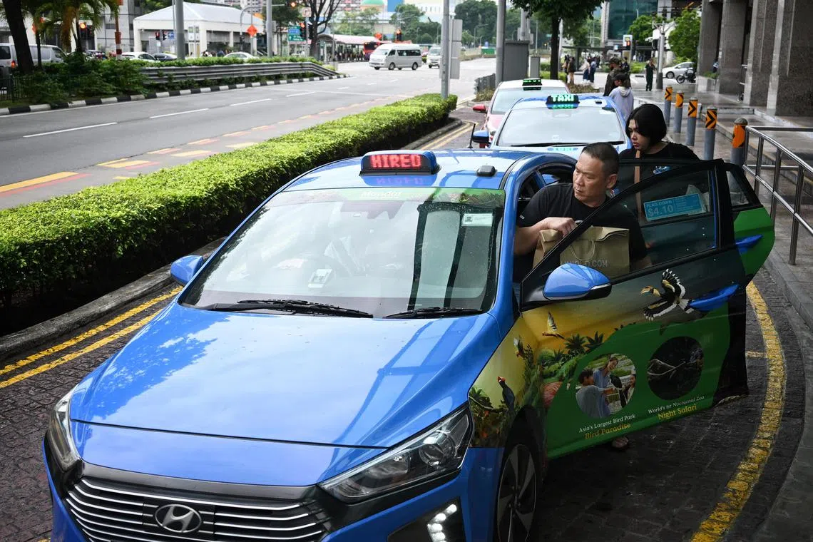 People boarding taxis at Bugis Junction on March 5, 2023: An increasingly uncommon sight?