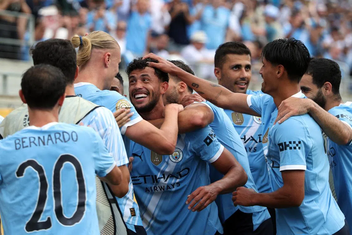 Soccer Football - FIFA Club World Cup - Group G - Juventus v Manchester City - Camping World Stadium, Orlando, Florida, U.S. - June 26, 2025  Manchester City's Erling Haaland celebrates scoring their third goal with Manchester City's Rodri, Manchester City's Matheus Nunes and Manchester City's Tijjani Reijnders IMAGN IMAGES via Reuters/Nathan Ray Seebeck
