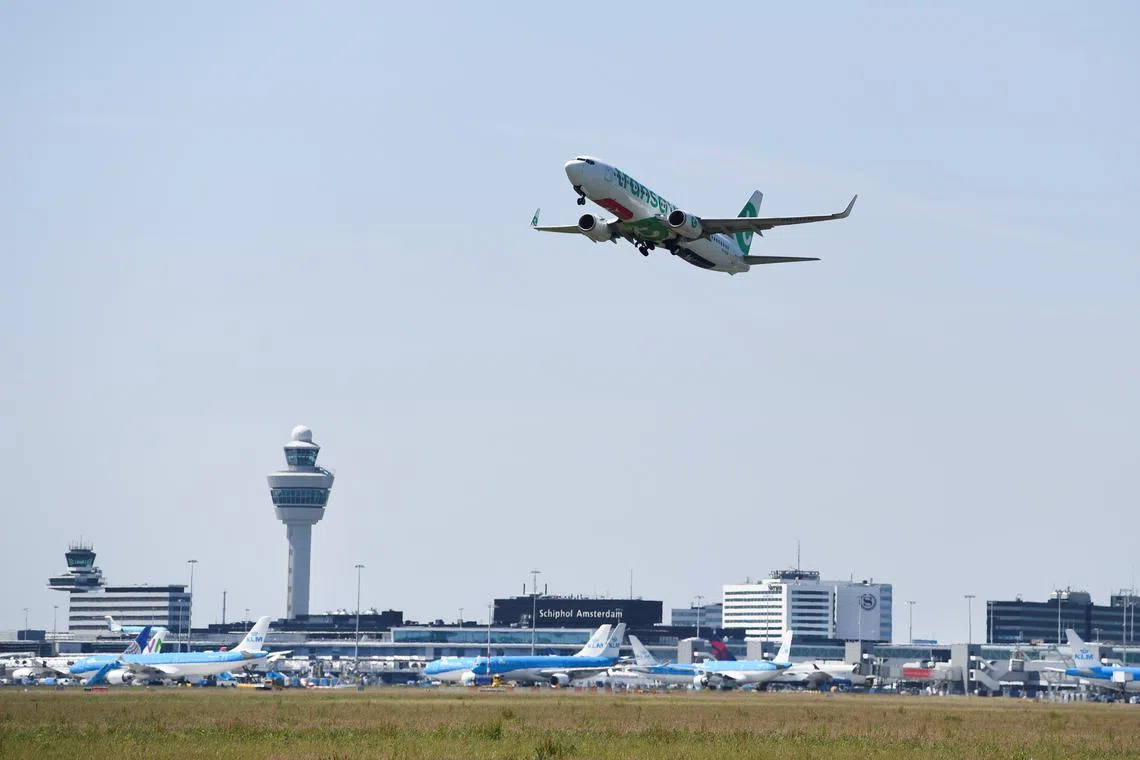 FILE PHOTO: An airplane takes off from Schiphol Airport in Amsterdam, Netherlands June 16, 2022. REUTERS/Piroschka van de Wouw/File Photo
