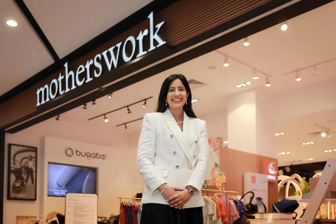 Ms Roshni Mahtani Cheung, whose company recently acquired retailer Motherswork, says her early struggles working to help her family pay the bills have served her well as an entreprenuer. ST PHOTO: GAVIN FOO