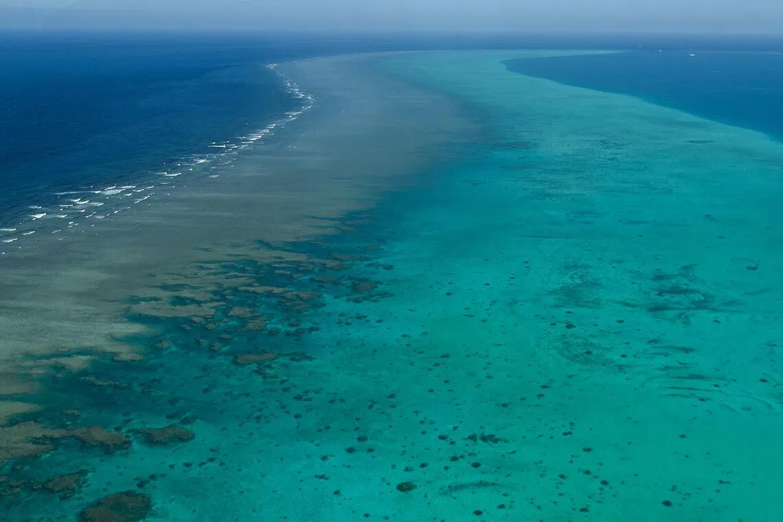 This photo taken on February 15, 2024 shows an aerial view over the Scarborough Shoal in the disputed South China Sea. 