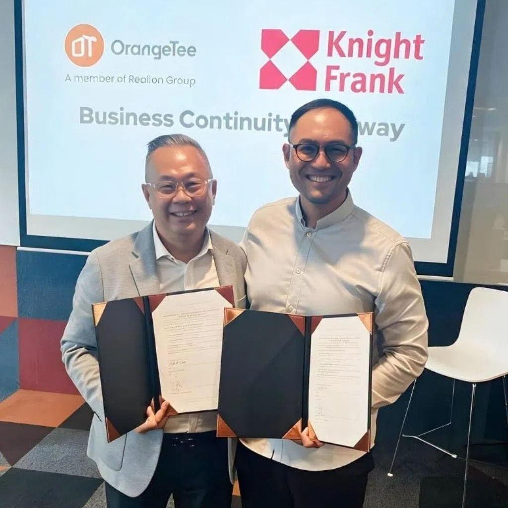 Justin Quek, CEO of OrangeTee and Deputy Group CEO of Realion Group (right), with Dr Tan Tee Khoon, head of KF Property Network.
