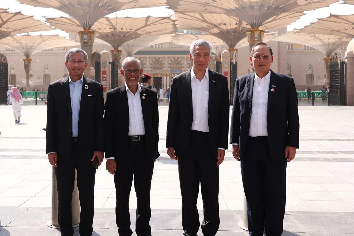 Accompanying PM Lee on the visit were (from left) Foreign Minister Vivian Balakrishnan, Social and Family Development Minister and Second Minister for Health Masagos Zulkifli, who is also Minister-in-charge of Muslim Affairs, and Manpower Minister and Second Minister for Trade and Industry Tan See Leng.