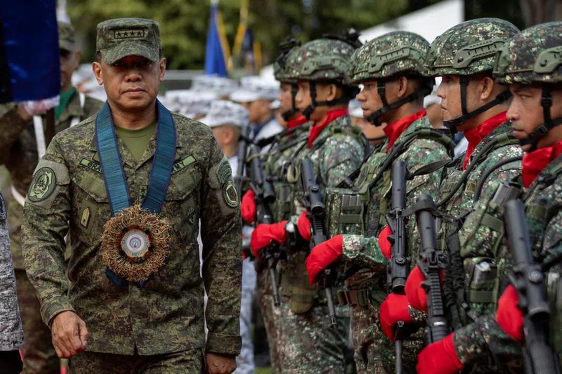 FILE PHOTO: Armed Forces of the Philippines Chief of Staff General Romeo Brawner Jr. walks past honor guards during the arrival ceremony at Western Command, Puerto Princesa, Palawan, Philippines, August 10, 2023. REUTERS/Eloisa Lopez/File Photo