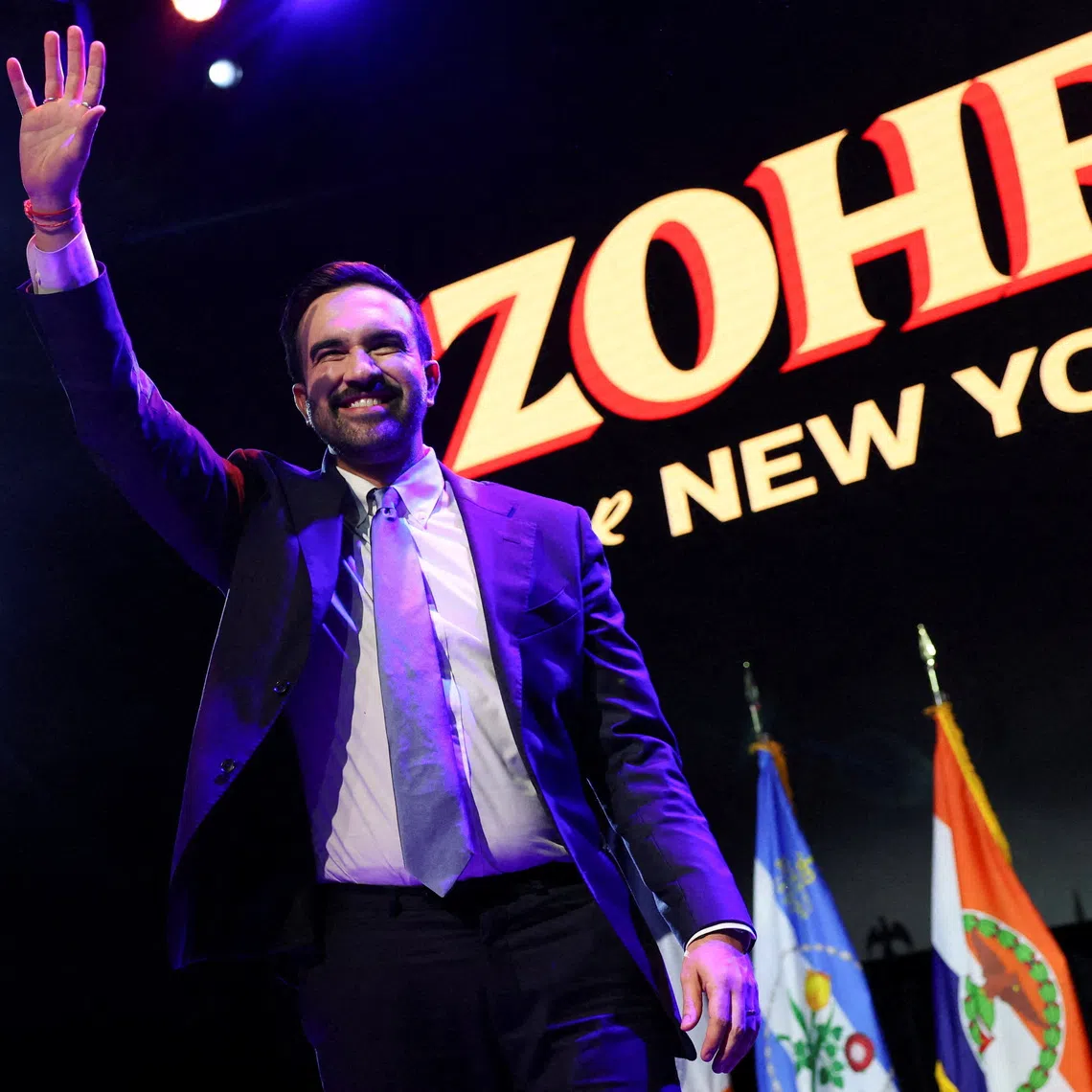 Democratic candidate for New York City mayor Zohran Mamdani waves on stage after winning the New York City Mayoral race, at his election night rally in the Brooklyn borough of New York City, November 4.  REUTERS/Shannon Stapleton