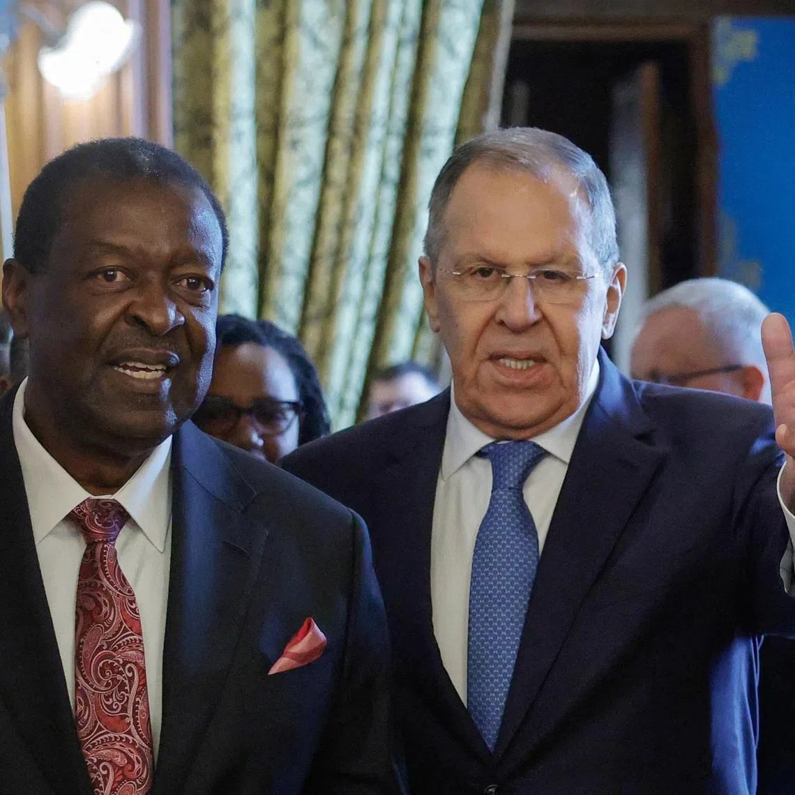 Russian Foreign Minister Sergei Lavrov and Kenyan Foreign Minister Musalia Mudavadi enter a hall during their meeting in Moscow, Russia, March 16, 2026. Tatyana Makeyeva/Pool via REUTERS