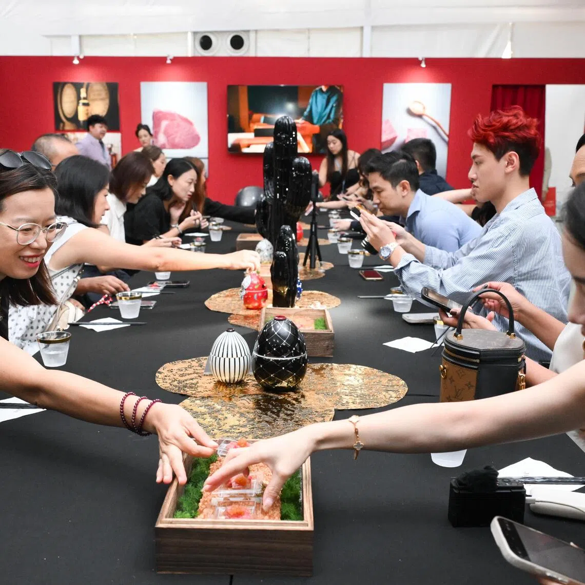 People sampling Matsusaka beef at Haute room
featured at luxury fair Ultraluxe 4th edition at a tent in front of Ngee Ann City on Oct 4, 2025.