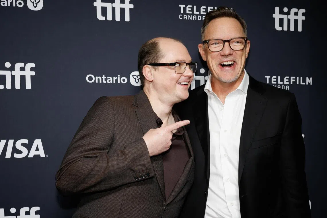 Director Mike Flanagan (left) and actor Matthew Lillard pose at the premiere of Carrie at the Toronto International Film Festival in Canada on Sept 18.