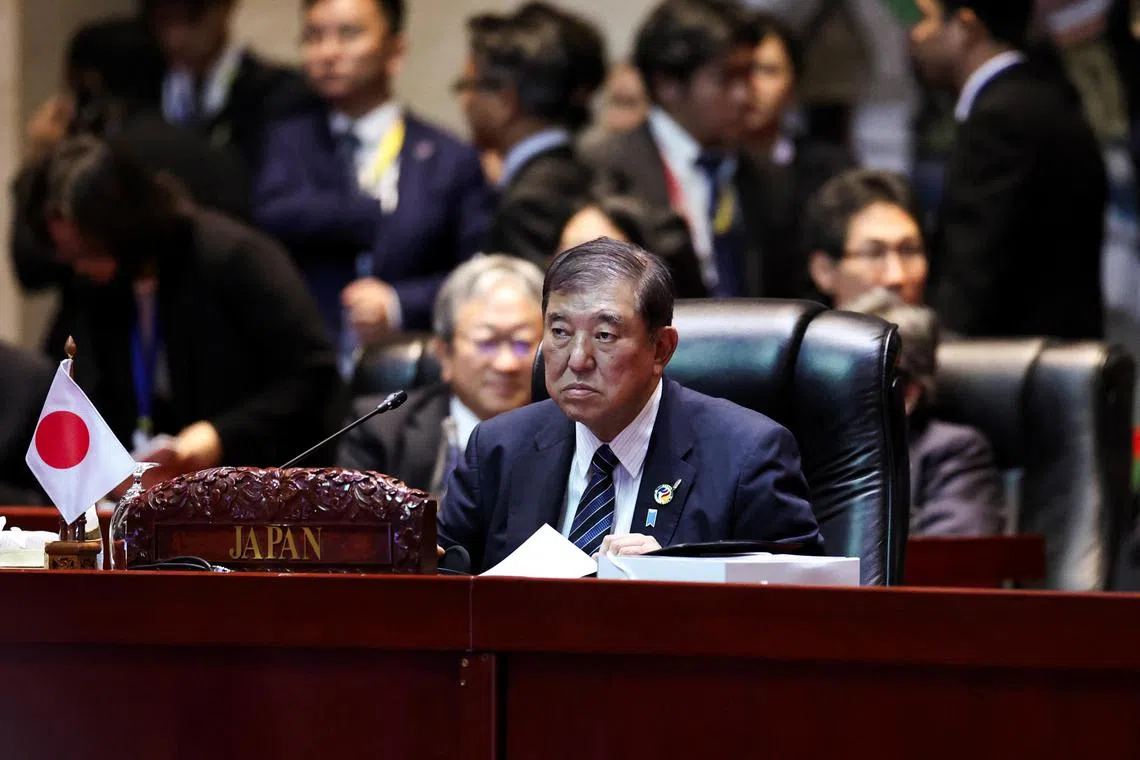 Japanese Prime Minister Shigeru Ishiba at the Asean Plus Three Summit in Vientiane on Oct 11.
