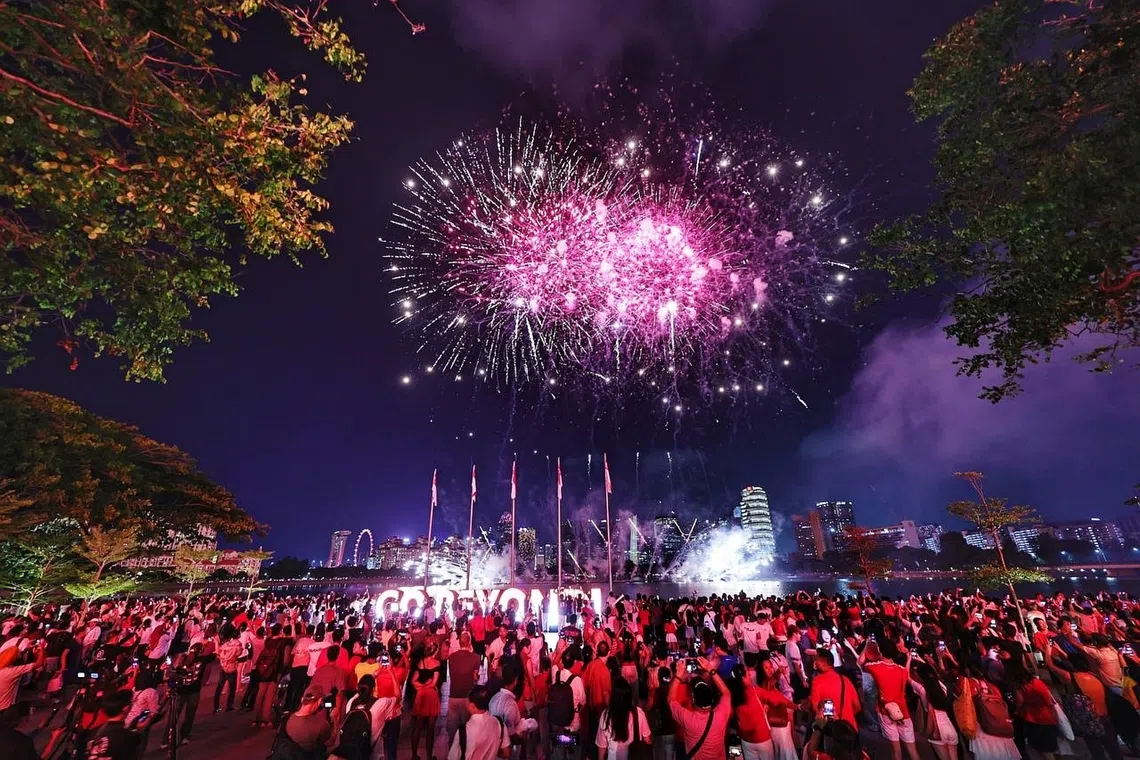 Fireworks bursting over the Kallang Basin during NDP 2026 on Aug 9.