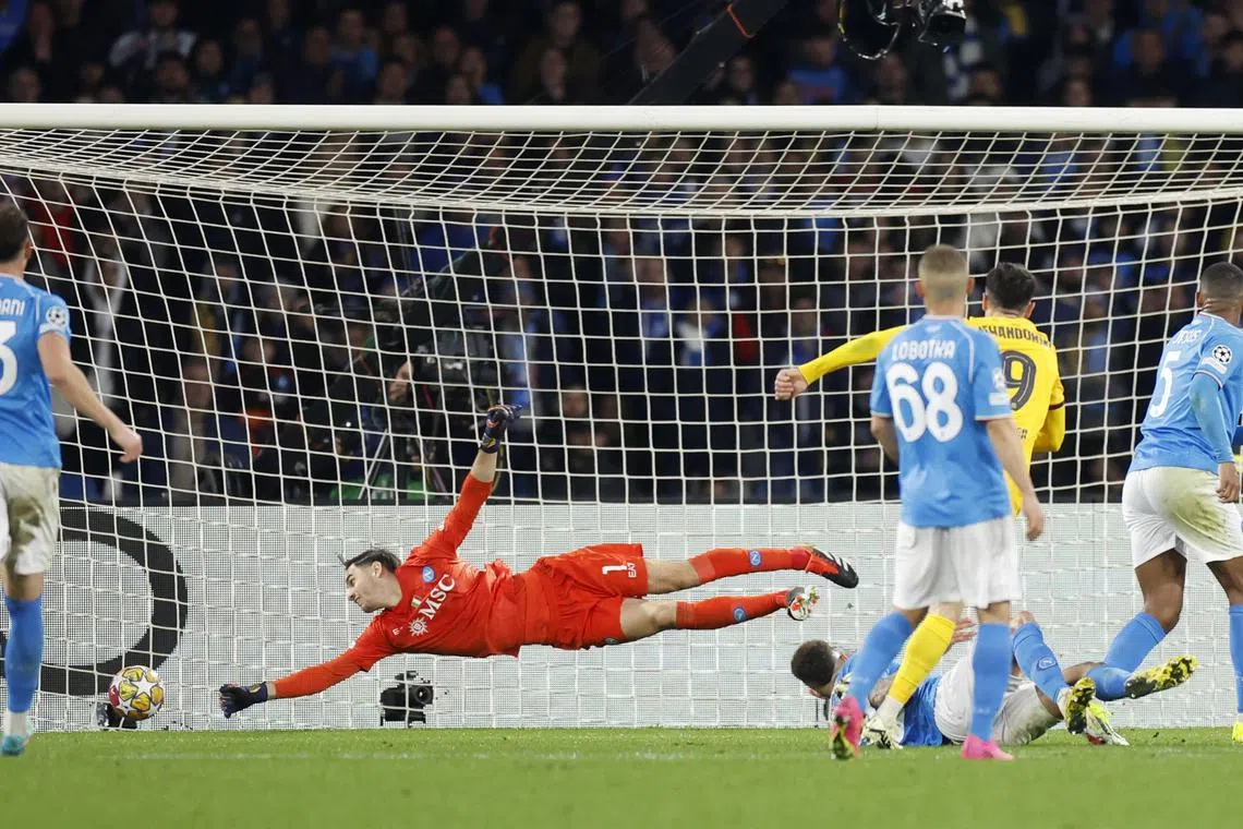 Soccer Football - Champions League - Round of 16 - First Leg - Napoli v FC Barcelona - Stadio Diego Armando Maradona, Naples, Italy - February 21, 2024 FC Barcelona's Robert Lewandowski scores their first goal REUTERS/Remo Casilli