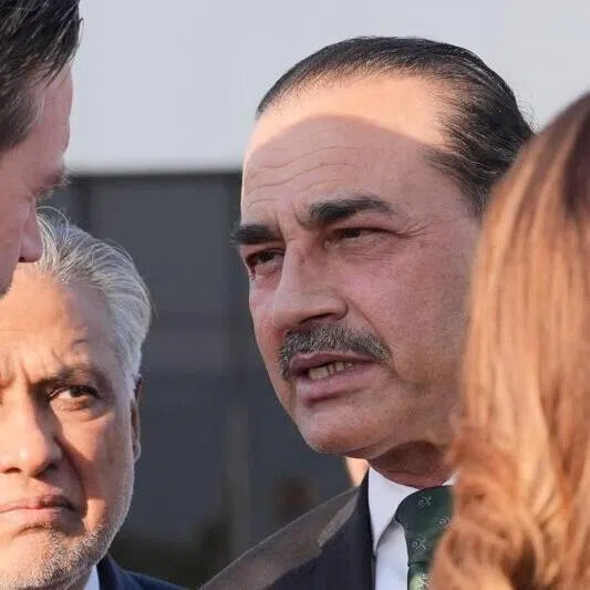 US Vice President JD Vance (L) talks to Pakistan's Chief of Defence Forces and Chief of Army Staff Field Marshall Asim Munir (R) and Pakistan's Deputy Prime Minister and Foreign Minister Mohammad Ishaq Dar (C) before boarding Air Force Two after attending talks on Iran in Islamabad on April 12, 2026. Iran and the United States failed to reach an agreement to end the war in the Middle East, US Vice President JD Vance said April 12 after marathon talks in Islamabad, adding that he was leaving negotiations after giving Tehran the "final and best offer". (Photo by Jacquelyn MARTIN / POOL / AFP)