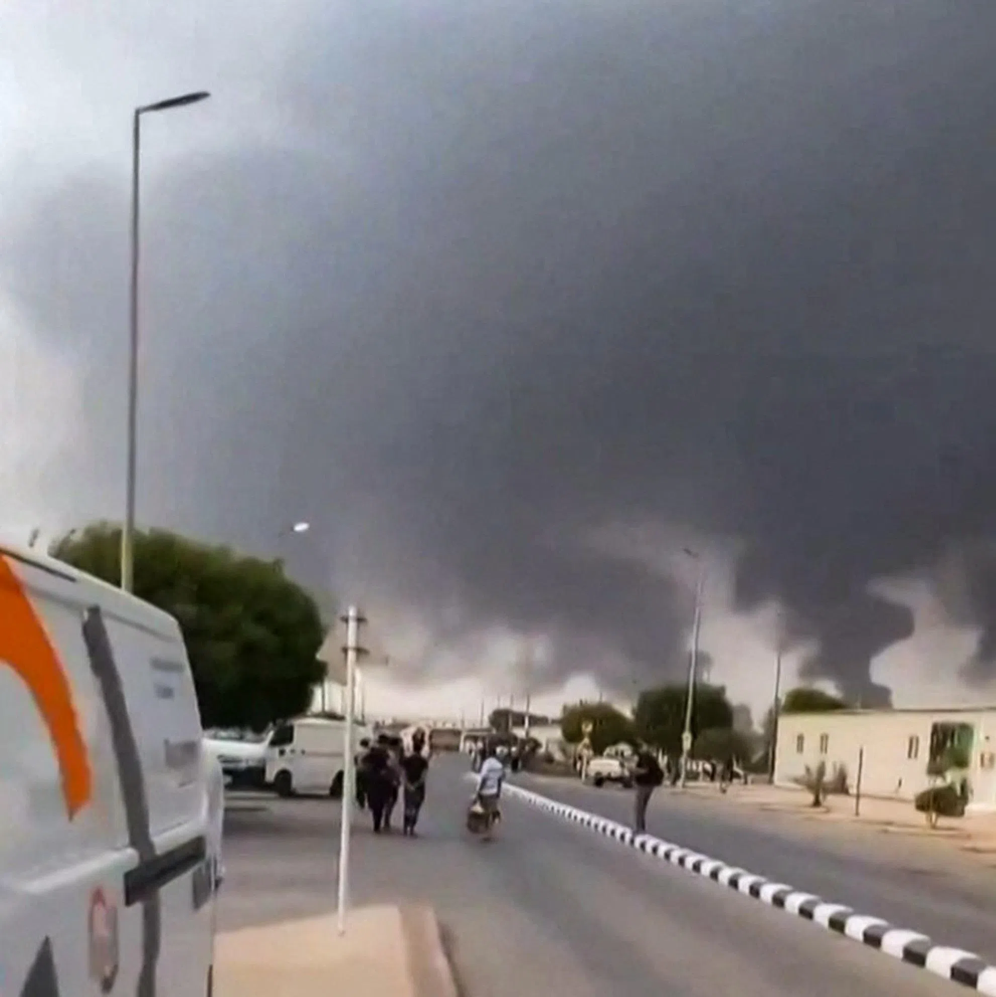 A screen grab from footage taken on July 25 and verified by AFP shows clouds of smoke rising after strikes on the Saudi Aramco refinery in Jizan.