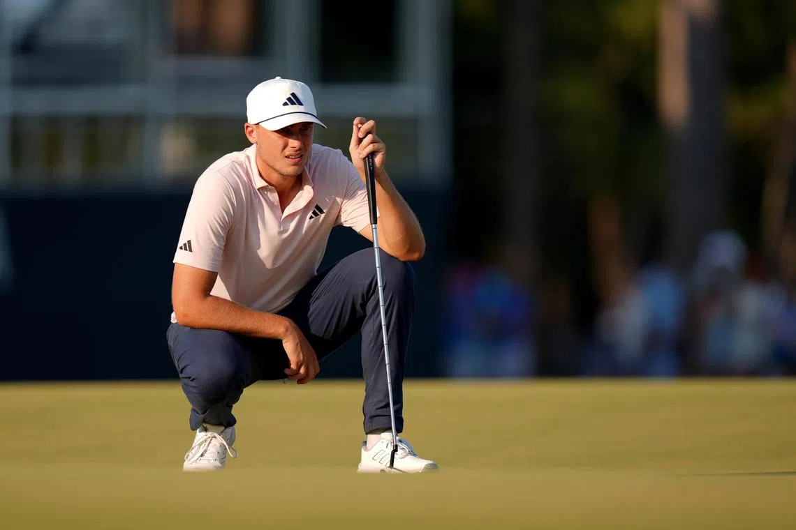 Jun 14, 2024; Pinehurst, North Carolina, USA; Ludvig Aberg lines up a putt on the 18th green during the second round of the U.S. Open golf tournament at Pinehurst No. 2. Mandatory Credit: Jim Dedmon-USA TODAY Sports