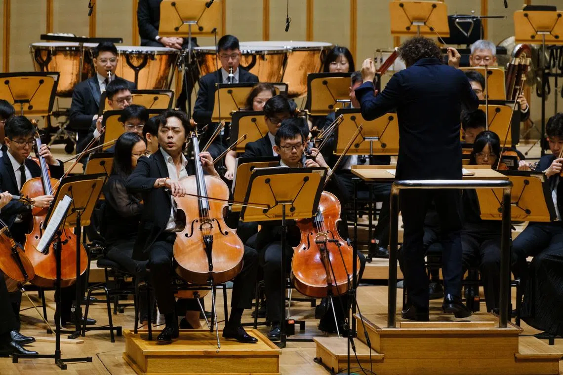 Cellist Qin Li-Wei played with the Orchestra Of The Music Makers under the guidance of guest French conductor Alexandre Bloch on May 29.