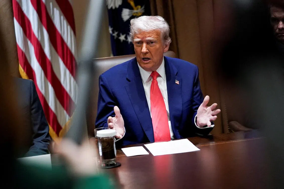 FILE PHOTO: U.S. President Donald Trump attends a cabinet meeting at the White House in Washington, D.C., U.S., April 10, 2025. REUTERS/Nathan Howard/File Photo