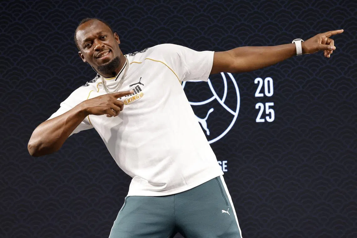 Athletics - Usain Bolt and Armand Duplantis during a Puma event in Tokyo ahead of the World Athletics Championships - Tokyo, Japan - September 11, 2025 Usain Bolt poses ahead of the World Athletics Championships REUTERS/Manami Yamada