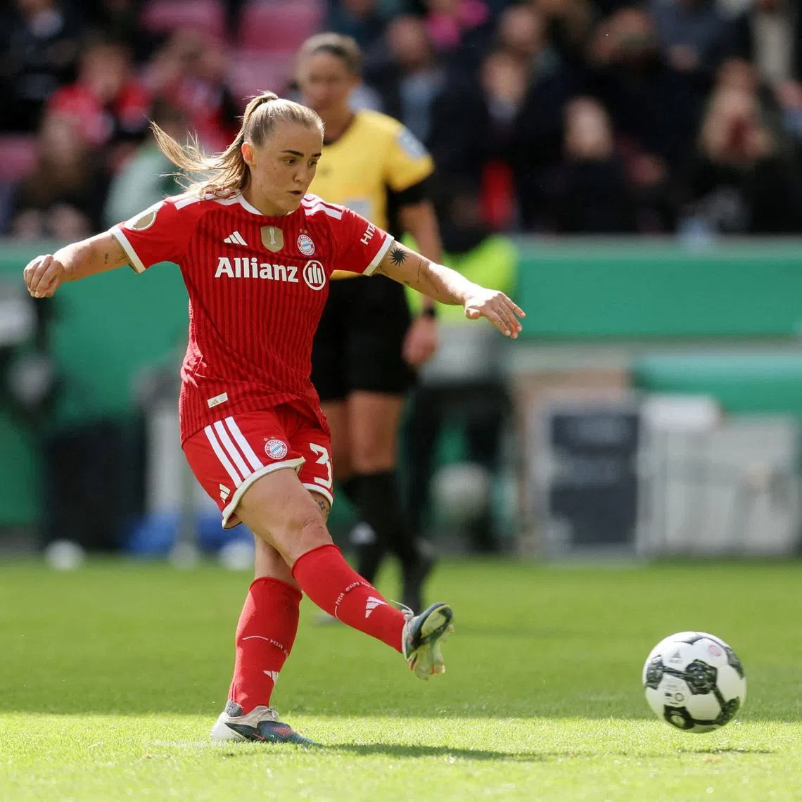 Soccer Football - DFB Cup - Women's Final - VfL Wolfsburg v Bayern Munich - RheinEnergieStadion, Cologne, Germany - May 14, 2026 Bayern Munich's Georgia Stanway scores their first goal from the penalty spot REUTERS/Leon Kuegeler