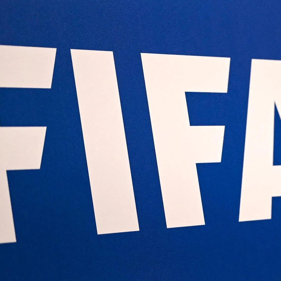 (FILES) (FILES) A picture shows the FIFA logo during a press conference held by the president of the football's governing body at the FIFA Executive Football Summit on February 15, 2019 in Istanbul. FIFA president has lost the "confidence" of the UEFA, European football's governing body, it said in a statement on August 1, 2026, after his plan to allow private investment in the World Cup was withdrawn following a global backlash. (Photo by OZAN KOSE / AFP)