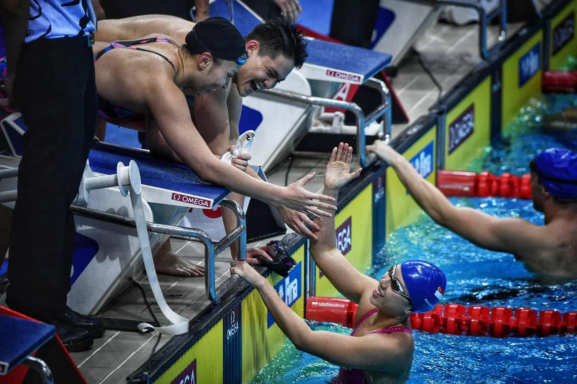 Singapore swimmers in high spirits during the 2018 Swimming World Cup at the OCBC Aquatic Centre in November 2018.