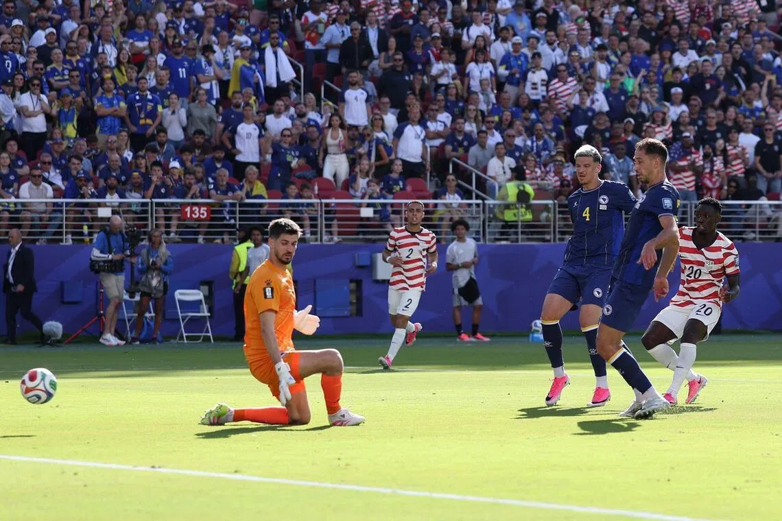 Folarin Balogun #20 of the United States scores his team’s first goal against Bosnia and Herzegovina at San Francisco Bay Area Stadium.