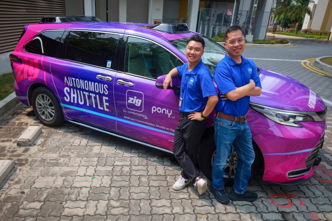 ST20260911_202692000678/esoperator15/Jason Quah William Tan (right), 42, fleet manager and Sherman Seng, 24, who joined Zig Driverless after completing his National Service, pictured Sep 11, 2026. ST PHOTO: JASON QUAH