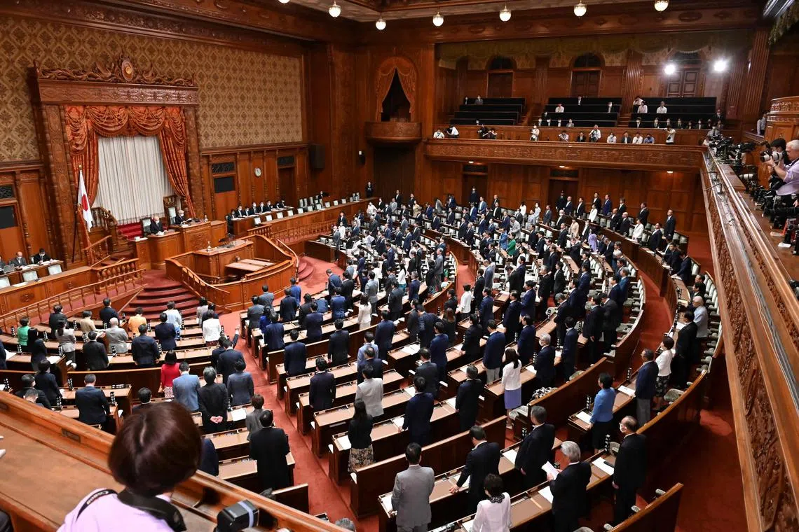 Members of the House of Councilors vote on a bill to revise the Penal Code in line with the reality of sex crimes at the plenary session of the House of Councillors in Tokyo on June 16, 2023. (Photo by Kazuhiro NOGI / AFP)