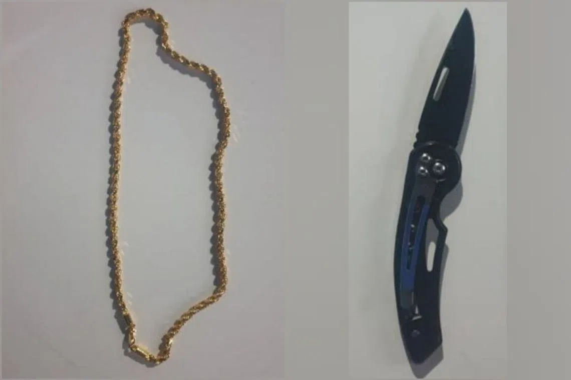 The stolen gold chain and a folding knife were also found in the suspect’s possession.