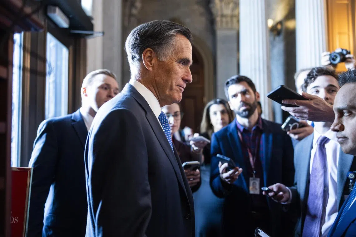 Republican Senator Mitt Romney, or Utah,  speaks with reporters after the Senate advanced a standalone foreign aid package for Ukraine and Israel, without any attached border security measures.