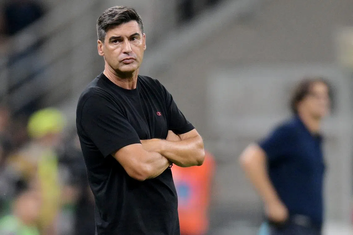 Soccer Football - Serie A - AC Milan v Torino - San Siro, Milan, Italy - August 17, 2024 AC Milan coach Paulo Fonseca reacts during the match REUTERS/Daniele Mascolo