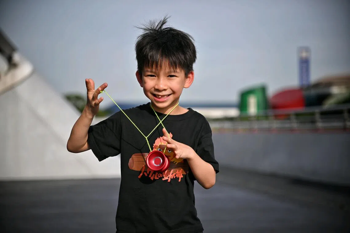 James Liew, 8, is are part of a new generation of peppy young players fronting a refreshed wave of interest in the hobby-sport.