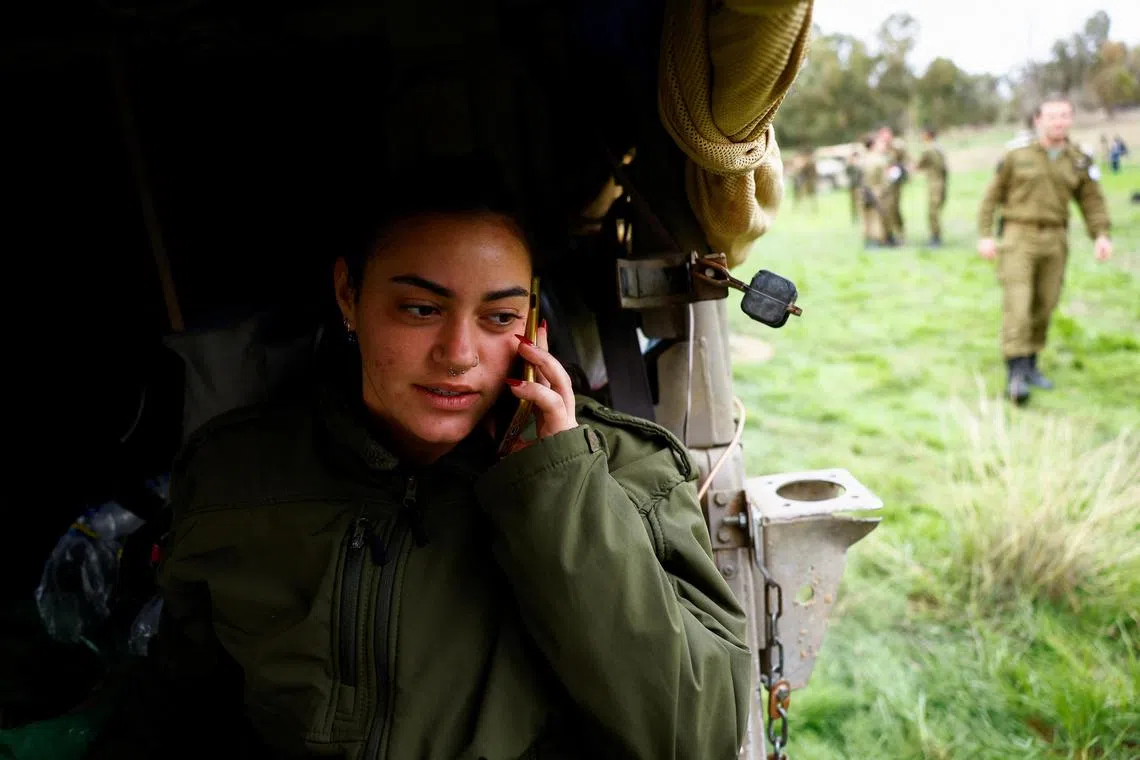 A female Israeli soldier seen in a military jeep near Israel's border with Gaza. 