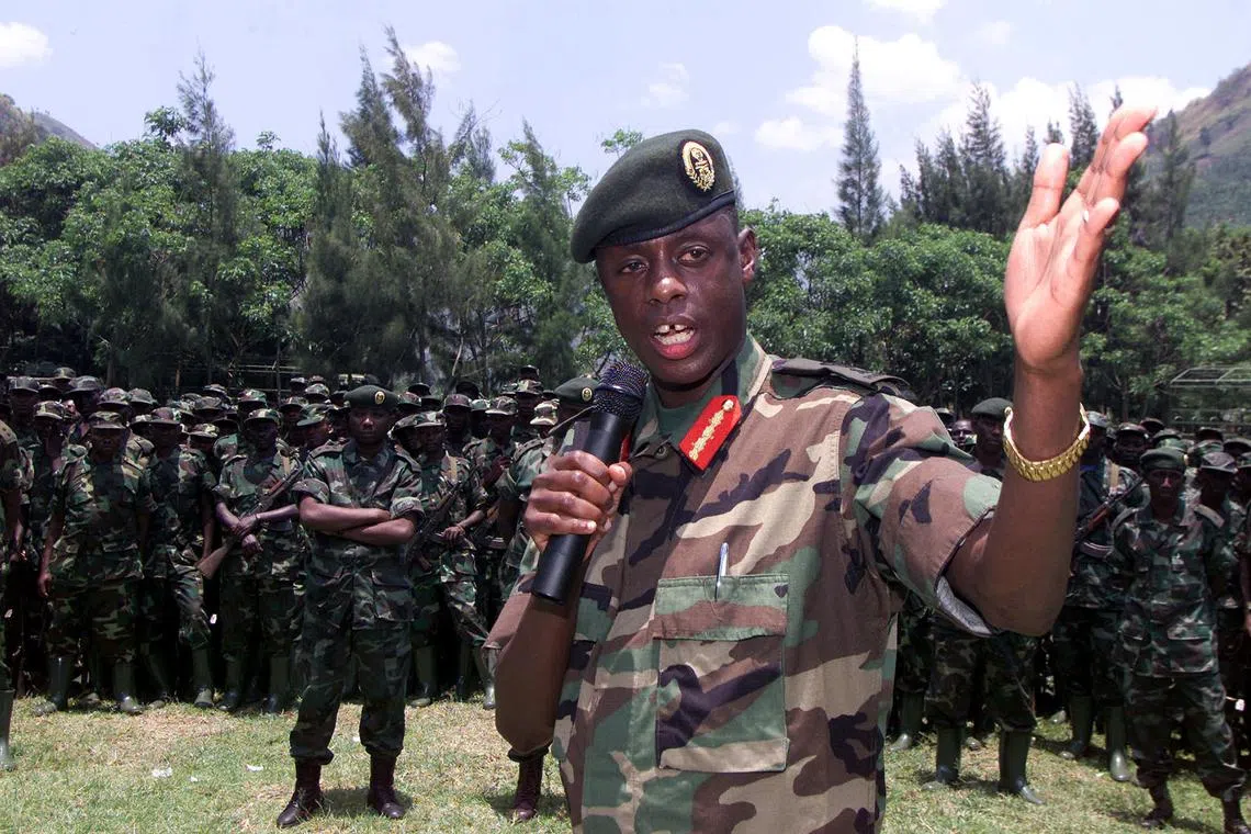 FILE PHOTO: Rwandan army chief James Kabarebe addresses soldiers pulling out of eastern Congo September 27, 2002. Reuters/File Photo