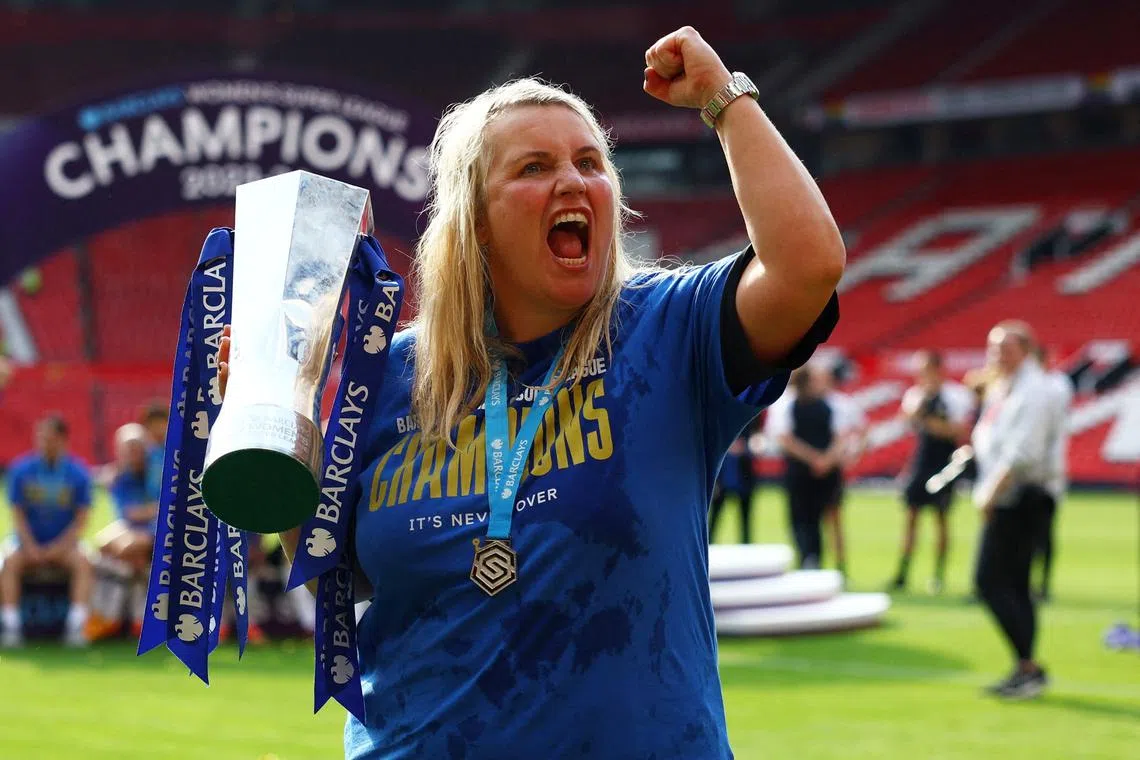 FILE PHOTO: Soccer Football - Women's Super League - Manchester United v Chelsea - Old Trafford, Manchester, Britain - May 18, 2024 Chelsea manager Emma Hayes celebrates with trophy after winning the Women's Super League REUTERS/Molly Darlington/File Photo