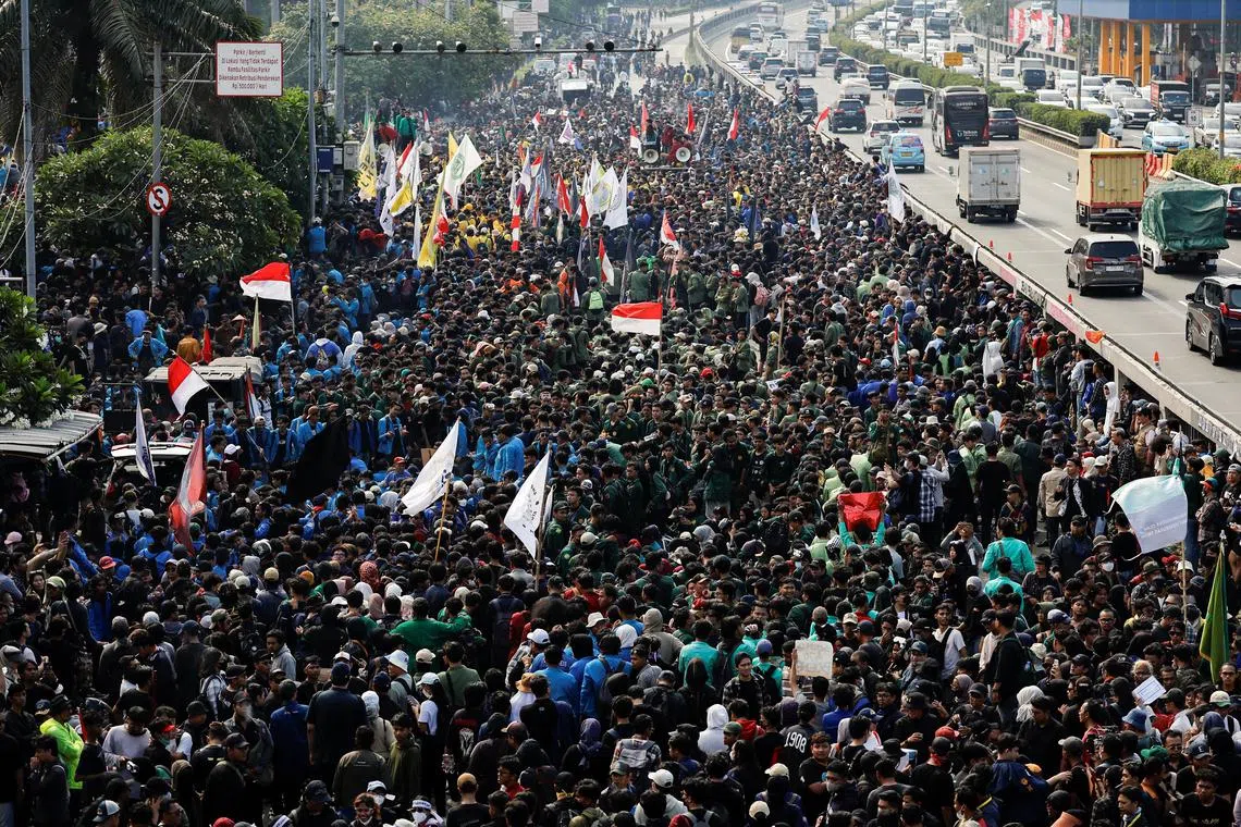 People protesting against controversial planned changes to the election law outside the Indonesian Parliament building in Jakarta on Aug 22.