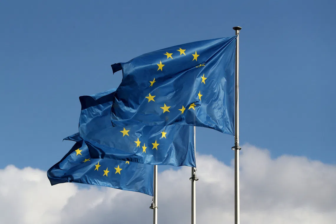 FILE PHOTO: European Union flags fly outside the EU Commission headquarters in Brussels, Belgium September 19, 2019. REUTERS/Yves Herman/File Photo