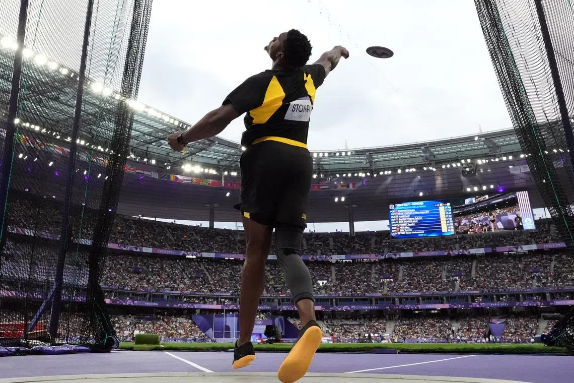 Paris 2024 Olympics - Athletics - Men's Discus Throw Final - Stade de France, Saint-Denis, France - August 07, 2024. Roje Stona of Jamaica in action REUTERS/Pawel Kopczynski