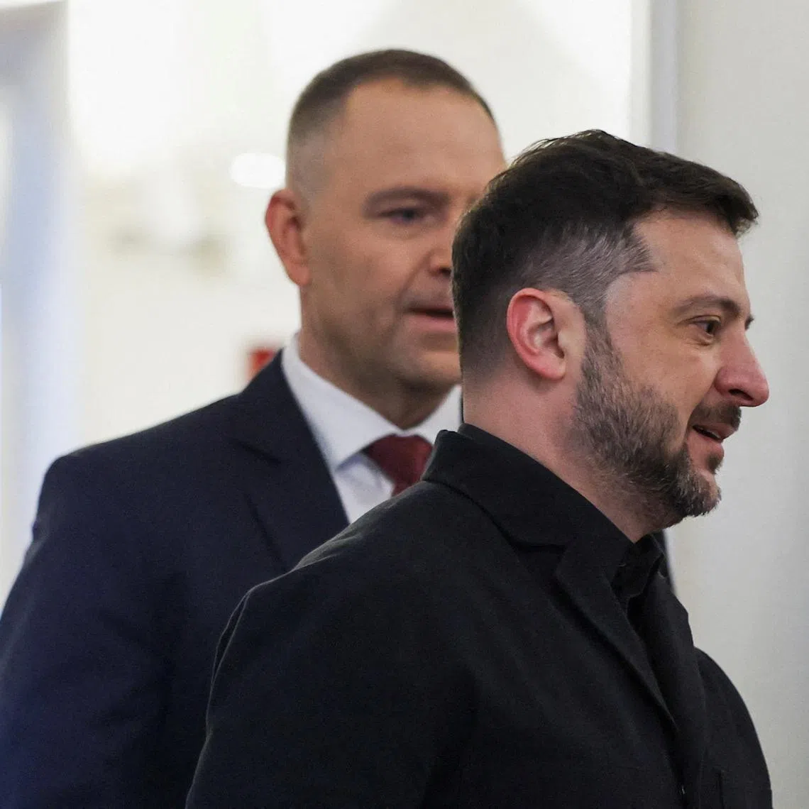 Ukrainian President Volodymyr Zelensky and Polish President Karol Nawrocki (left) at the Presidential Palace in Warsaw, Poland, on Dec 19, 2025. The Ukrainian president caused outrage by renaming an army unit after a paramilitary group which massacred Poles in World War Two.