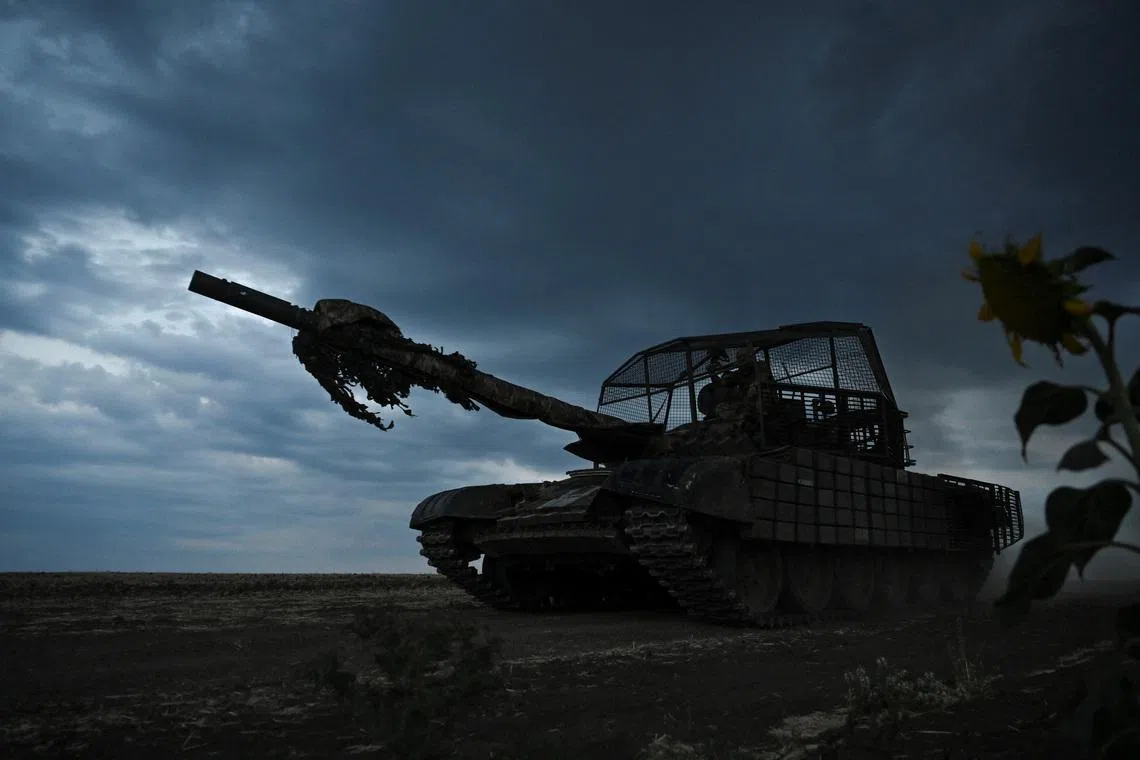 FILE PHOTO: A Ukrainian serviceman of the 118th Separate Mechanized Brigade rides atop of a T-72 tank during military exercises near a front line, amid Russia's attack on Ukraine, in Zaporizhzhia region, Ukraine July 21, 2024. REUTERS/Stringer/File Photo