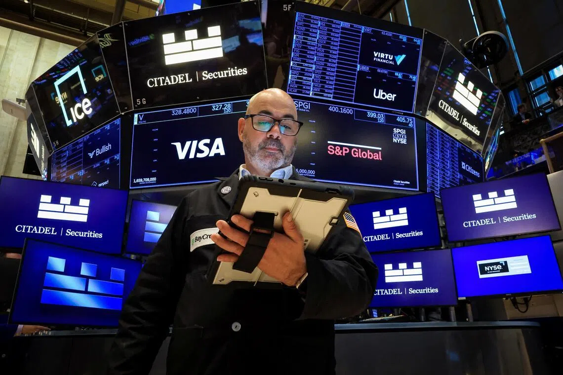 A trader working on the floor of the New York Stock Exchange, in New York City, on June 24.