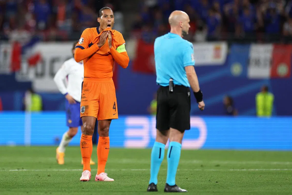 Netherlands' Virgil Van Dijk reacts to a VAR check for a team goal during the UEFA Euro 2024 match between the Netherlands and France at the Leipzig Stadium on June 21.