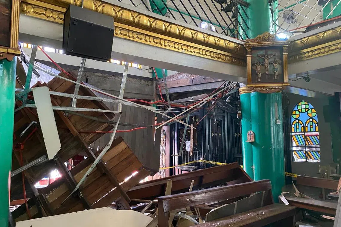 This handout photo shows the balcony of a church in the Philippines that collapsed due to termite infestation, killing an 80-year-old woman.