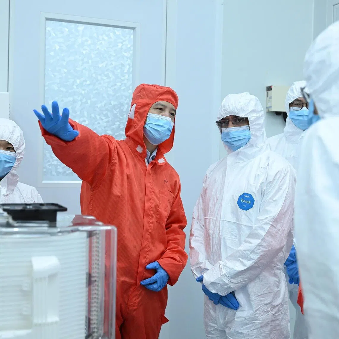 Dr Richard Yang, founder and CEO, Applied Angstrom Technology gives a tour of the cleanroom of the Atomic Precision Innovation Center on March 18.
