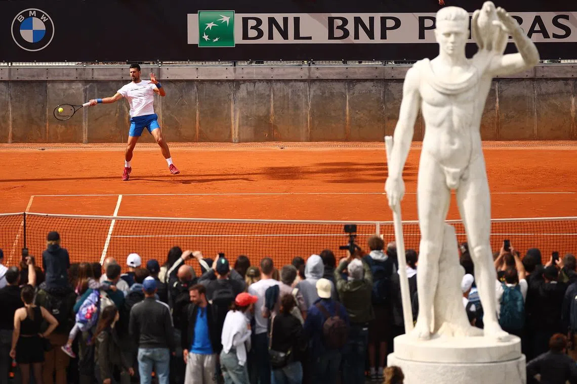 Tennis - Italian Open - Foro Italico, Rome, Italy - May 7, 2024 Serbia's Novak Djokovic during practice REUTERS/Guglielmo Mangiapane